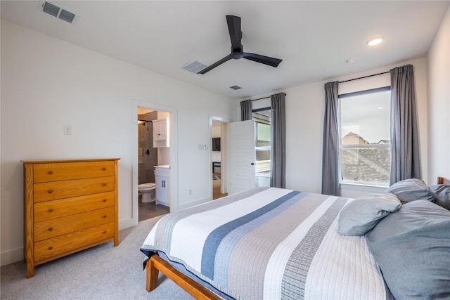 1400 Island Vista Dr, Arlington, TX 76005 - bedroom with light carpet, a ceiling fan, connected bathroom, and visible vents