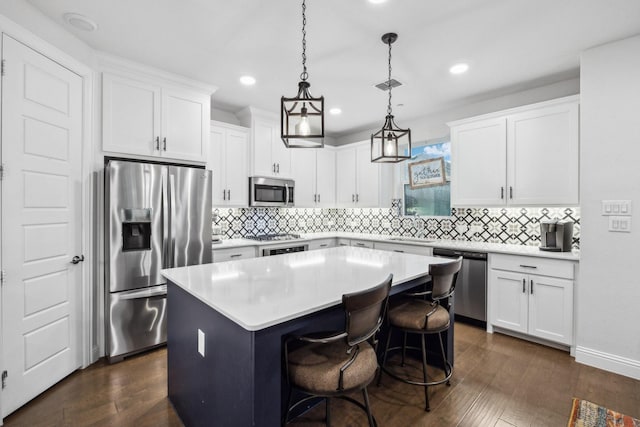 9408 Lamar St Unit D, Rowlett, TX 75089 - kitchen featuring stainless steel appliances, a sink, dark wood-style flooring, tasteful backsplash, and recessed lighting