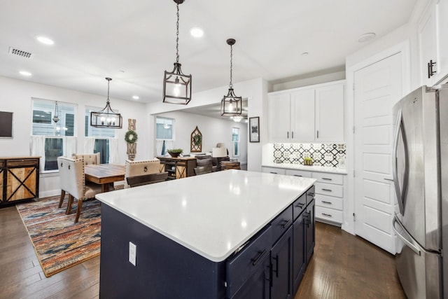 9408 Lamar St Unit D, Rowlett, TX 75089 - kitchen featuring freestanding refrigerator, dark wood-style floors, white cabinetry, and recessed lighting