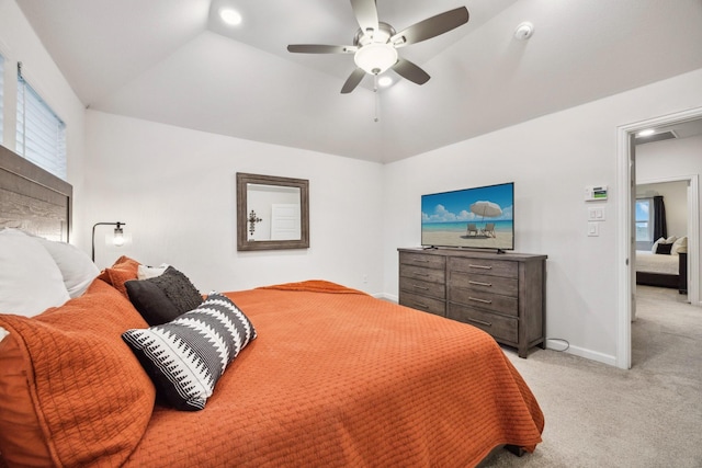 9408 Lamar St Unit D, Rowlett, TX 75089 - bedroom featuring light colored carpet, vaulted ceiling, baseboards, and a ceiling fan