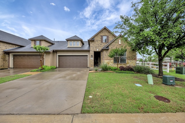 view of front of property featuring a front yard, a garage, brick siding, concrete driveway, and a shingled roof