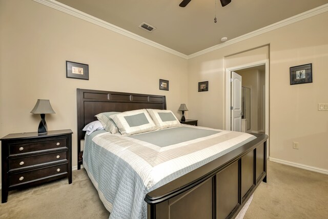 bedroom with crown molding, light carpet, a ceiling fan, baseboards, and visible vents