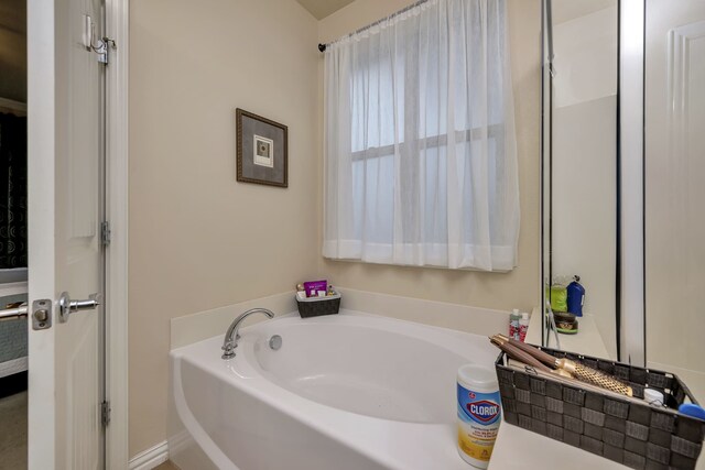 bathroom featuring a garden tub