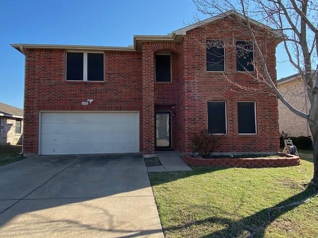 1025 W Stone Chapel Way, Fort Worth, TX 76179 - traditional-style house with an attached garage, concrete driveway, a front lawn, and brick siding
