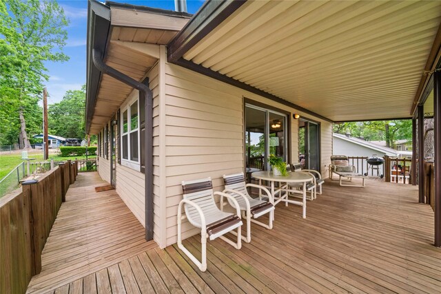 wooden deck with area for grilling