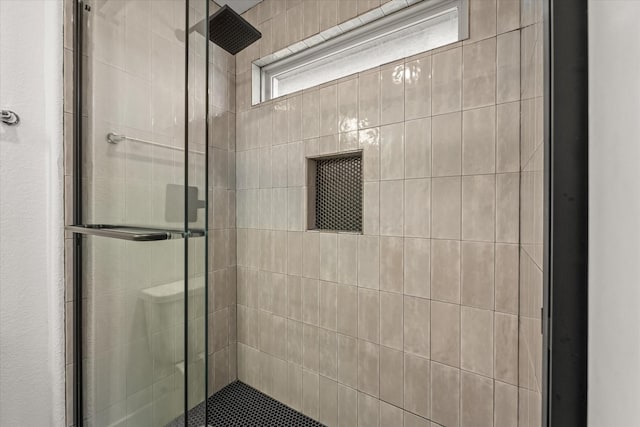 full bathroom with a shower stall