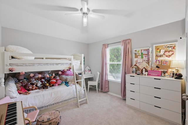 bedroom with baseboards, a ceiling fan, and light colored carpet