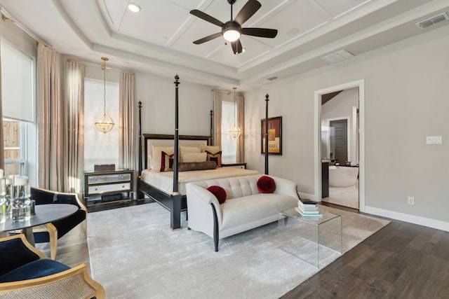 13420 Tim Tam Cir, Frisco, TX 75035 - bedroom with baseboards, visible vents, wood finished floors, and a raised ceiling