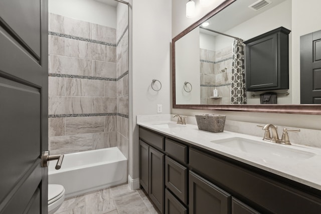 13420 Tim Tam Cir, Frisco, TX 75035 - full bathroom featuring toilet, visible vents, a sink, and shower / bath combo with shower curtain