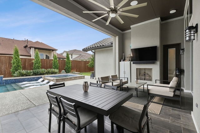 13420 Tim Tam Cir, Frisco, TX 75035 - view of patio / terrace with a fenced backyard, a ceiling fan, a pool with connected hot tub, and a fireplace