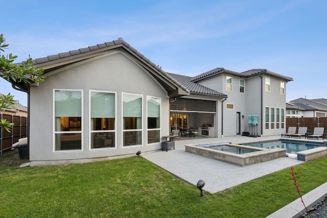 13420 Tim Tam Cir, Frisco, TX 75035 - rear view of house with a lawn, a fenced backyard, and a patio area