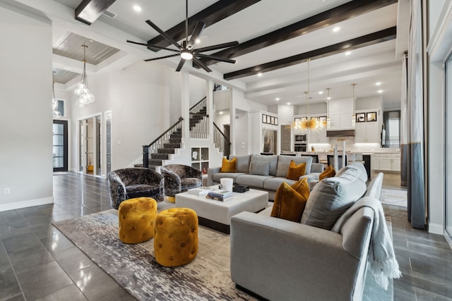 13420 Tim Tam Cir, Frisco, TX 75035 - living area with beamed ceiling, recessed lighting, baseboards, and stairs