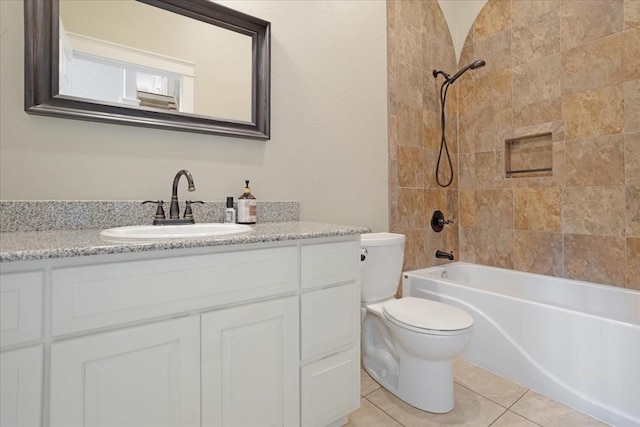 full bath featuring toilet, tub / shower combination, tile patterned flooring, and vanity