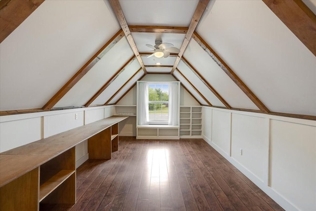additional living space featuring lofted ceiling with beams, dark wood-style flooring, and ceiling fan
