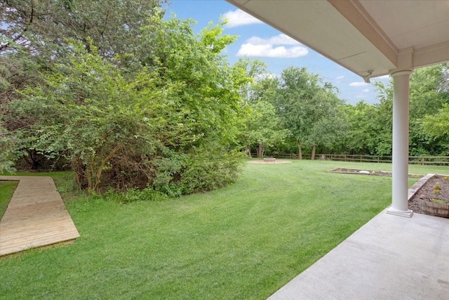 view of yard with fence
