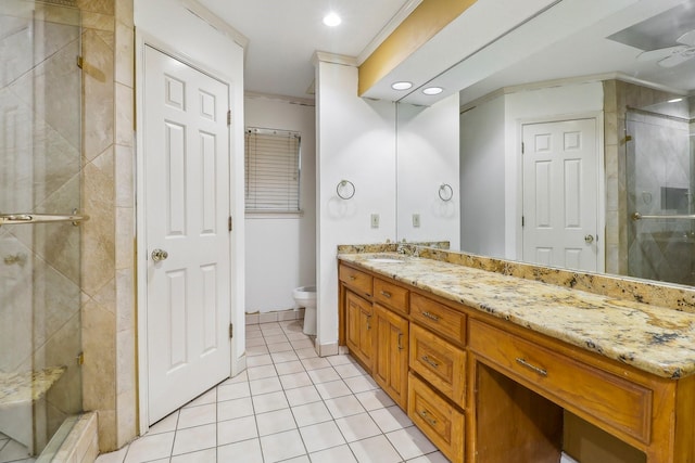 full bathroom featuring a shower stall, vanity, tile patterned floors, toilet, and recessed lighting