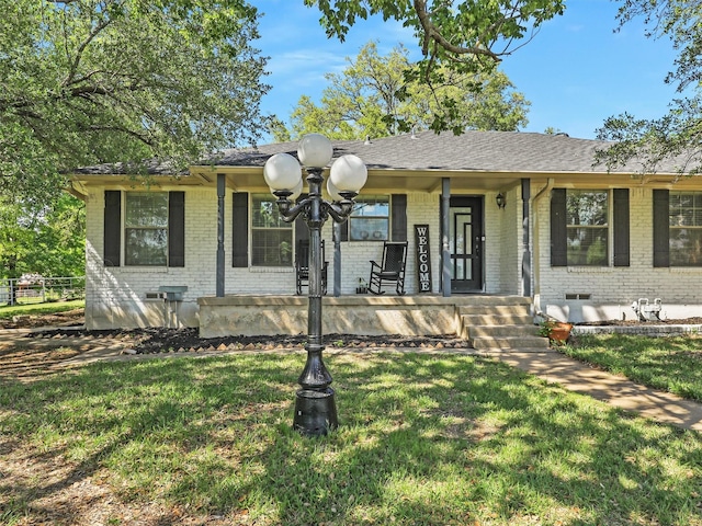 2802 Cinnamon Springs Rd, Glenn Heights, TX 75154 - ranch-style home with a porch, brick siding, crawl space, and a front yard