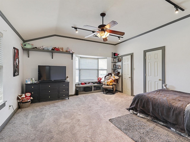 2802 Cinnamon Springs Rd, Glenn Heights, TX 75154 - carpeted bedroom featuring a ceiling fan, vaulted ceiling, track lighting, baseboards, and ornamental molding