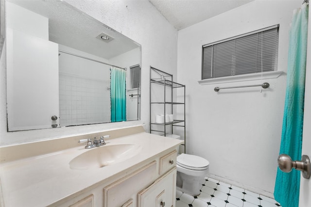 full bathroom with tile patterned floors, vanity, toilet, and a shower with shower curtain