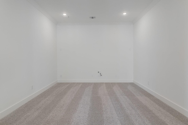 unfurnished room with visible vents, recessed lighting, ornamental molding, and light colored carpet