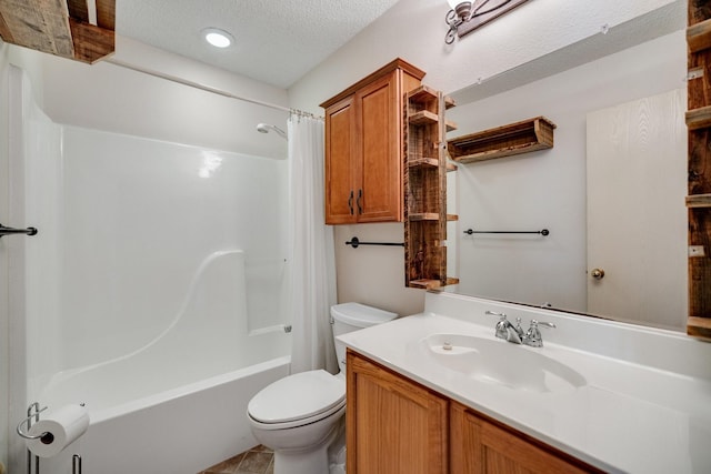 bathroom with a textured ceiling, vanity, tile patterned floors, toilet, and shower / bath combo with shower curtain