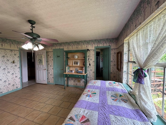 46916 US Highway 69 N, Bullard, TX 75757 - interior space featuring wallpapered walls, ceiling fan, baseboards, and tile patterned floors