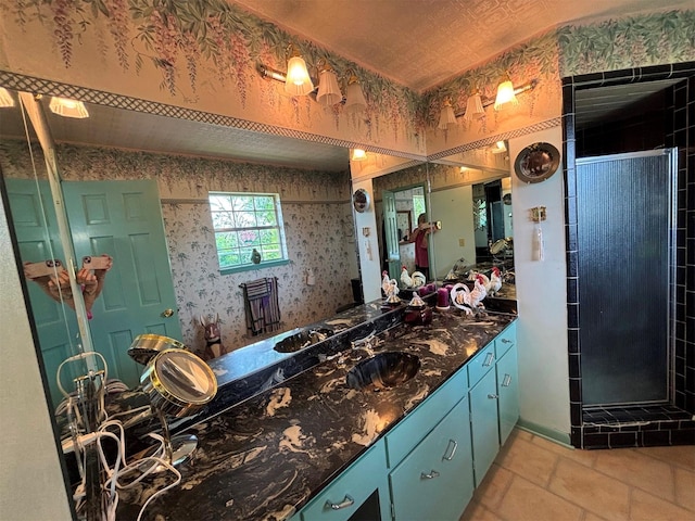 46916 US Highway 69 N, Bullard, TX 75757 - bathroom with vanity, tile patterned floors, a shower stall, and wallpapered walls
