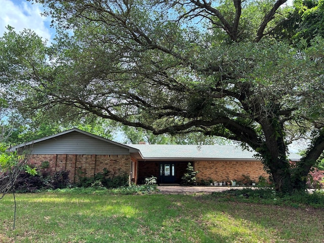 46916 US Highway 69 N, Bullard, TX 75757 - view of front of home with a front lawn and brick siding
