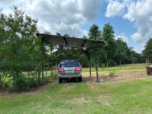 46916 US Highway 69 N, Bullard, TX 75757 - view of parking with a detached carport and fence