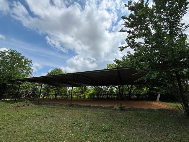 46916 US Highway 69 N, Bullard, TX 75757 - view of parking / parking lot with a covered structure