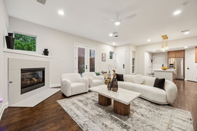 living area with french doors, recessed lighting, a ceiling fan, visible vents, and dark wood-style floors