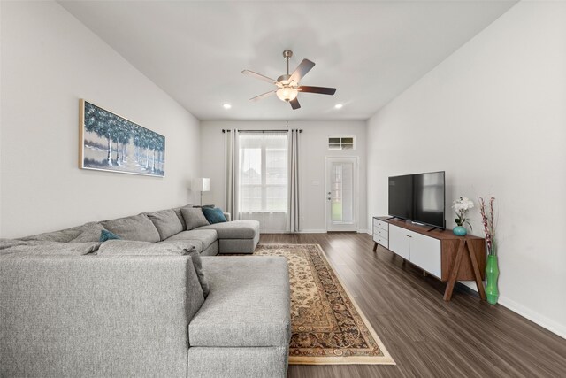 living area featuring baseboards, ceiling fan, recessed lighting, and wood finished floors