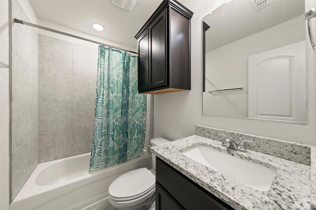 bathroom with visible vents, shower / tub combo, vanity, toilet, and recessed lighting