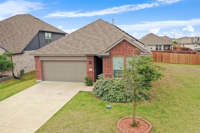 517 Williams Way, Van Alstyne, TX 75495 - view of front facade with a garage, a front lawn, fence, roof with shingles, and concrete driveway