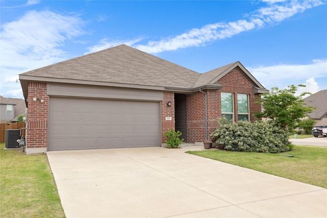 517 Williams Way, Van Alstyne, TX 75495 - single story home featuring brick siding, an attached garage, driveway, and a front yard
