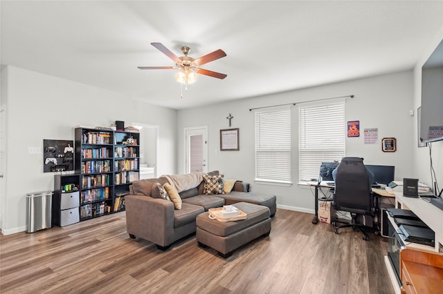 517 Williams Way, Van Alstyne, TX 75495 - living room featuring baseboards, a ceiling fan, and wood finished floors