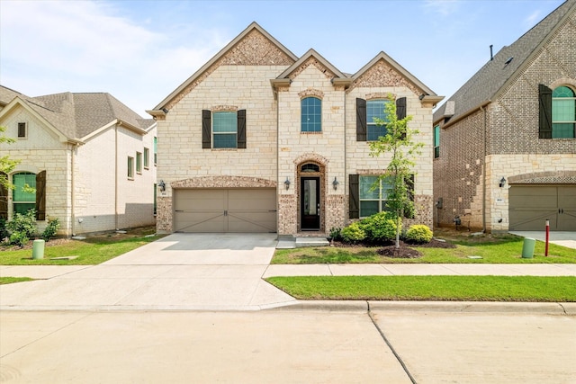 view of front of house featuring brick siding, a garage, and driveway