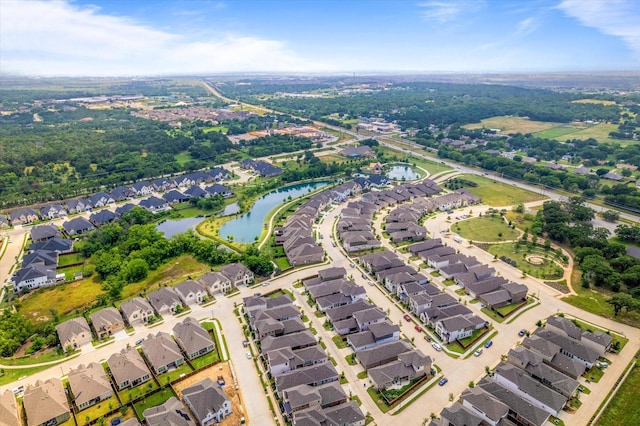 aerial view with a residential view and a water view