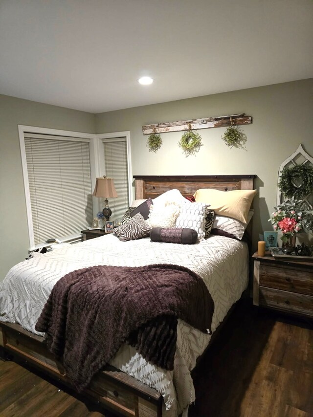 bedroom featuring recessed lighting and wood finished floors
