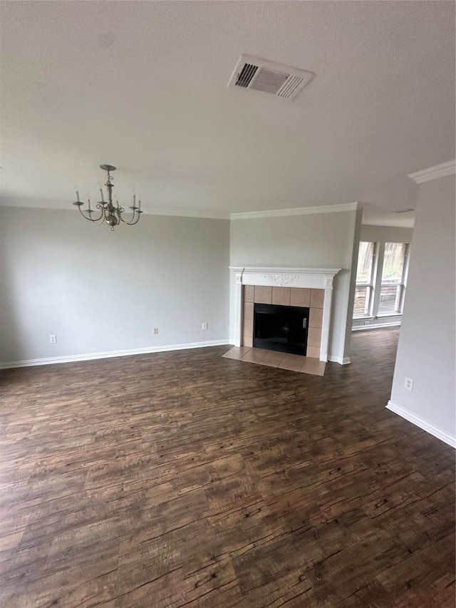 914 Gallant Fox Dr, Dallas, TX 75211 - unfurnished living room featuring dark wood-style flooring, baseboards, a chandelier, and ornamental molding