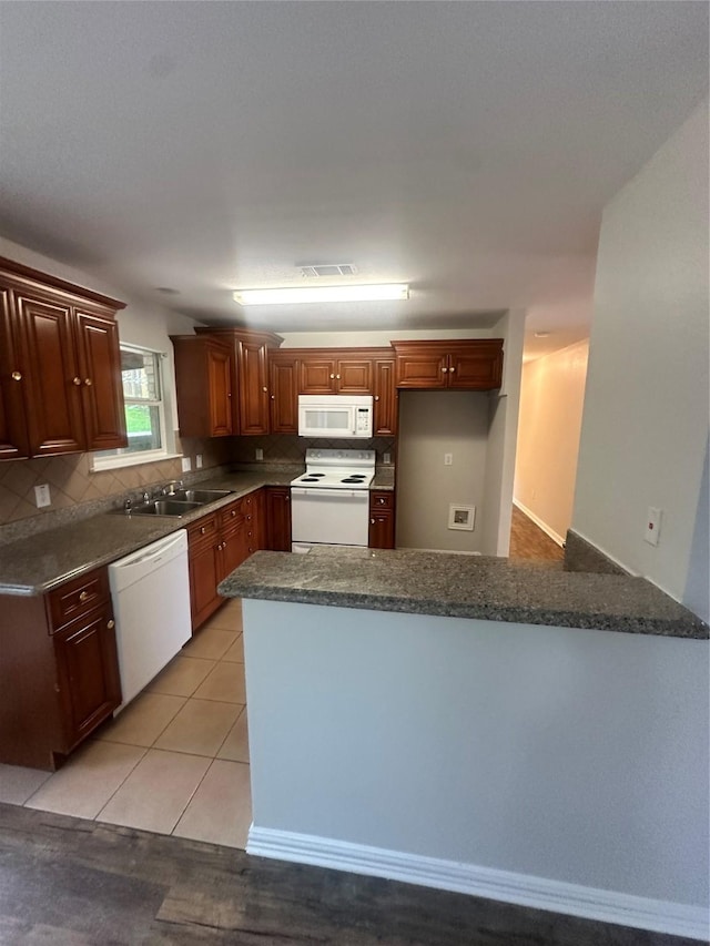 914 Gallant Fox Dr, Dallas, TX 75211 - empty room with a ceiling fan, baseboards, and dark wood-type flooring