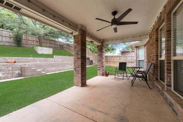 view of patio / terrace featuring ceiling fan and a fenced backyard