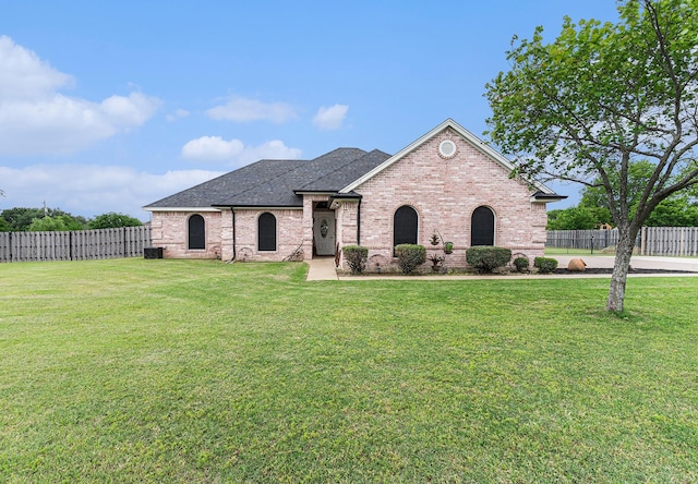 303 Valley View Ct, Rio Vista, TX 76093 - french provincial home with brick siding, a shingled roof, and central AC unit