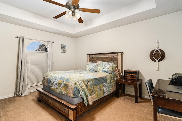 303 Valley View Ct, Rio Vista, TX 76093 - carpeted bedroom with a tray ceiling, baseboards, and ceiling fan
