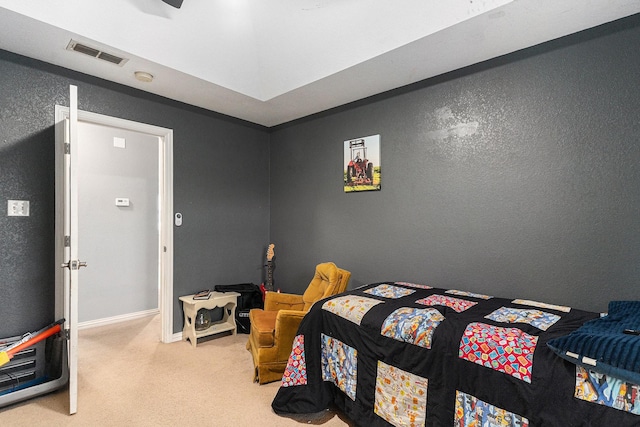 303 Valley View Ct, Rio Vista, TX 76093 - bedroom featuring carpet flooring, visible vents, baseboards, and a textured wall