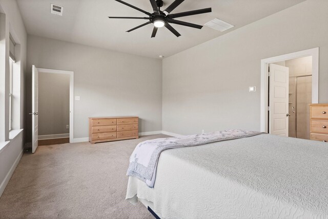 bedroom featuring baseboards, carpet, a ceiling fan, and visible vents