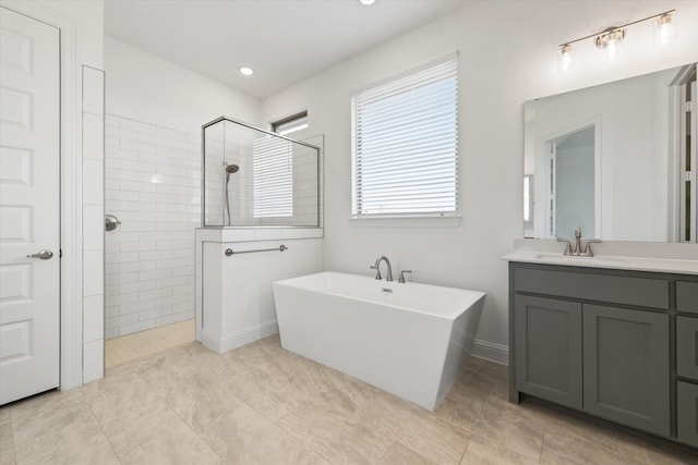 149 Highgate Ct, Boyd, TX 76023 - full bath with a freestanding tub, walk in shower, tile patterned floors, and vanity