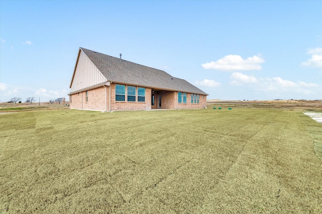 149 Highgate Ct, Boyd, TX 76023 - view of front of home featuring a shingled roof, a front yard, and brick siding