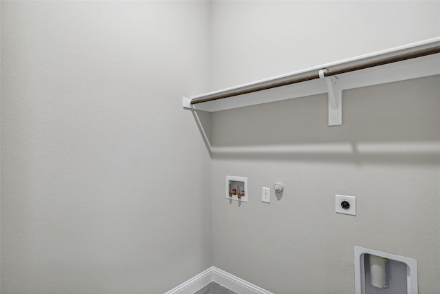 clothes washing area with washer hookup, laundry area, baseboards, electric dryer hookup, and hookup for a gas dryer