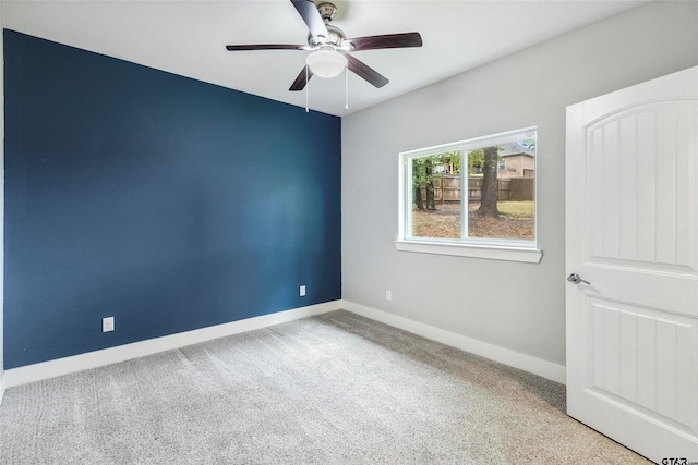 12090 Hackberry Holw, Tyler, TX 75706 - carpeted spare room with baseboards and a ceiling fan
